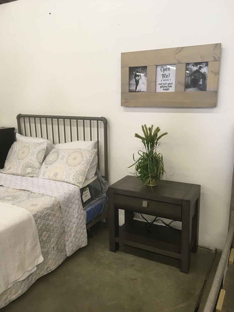 Gray Secret Shelfie holding decorative pillows